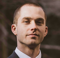 Portret przedstawiający Thomasa Whitfielda, analityka tradingu i eksperta rynku kryptowalut